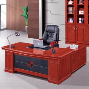 Professional office setup featuring a sleek desk, laptop, and organized storage cabinet for corporate use