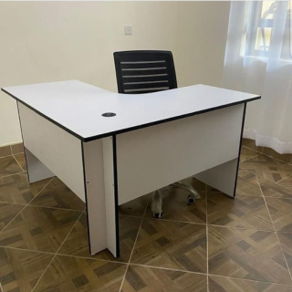 Modern L-shaped workstation with durable finish and cable management