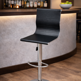 Adjustable bar stool with padded seat and chrome pedestal base in bar setting